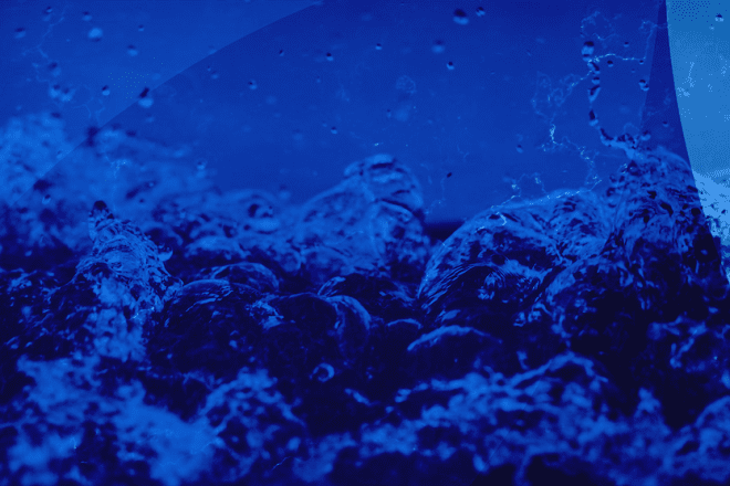 Rocks under the water with blue filter